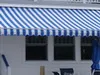 Awnings and tarpaulins cleaning