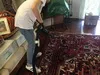 Vacuum cleaning and shaking